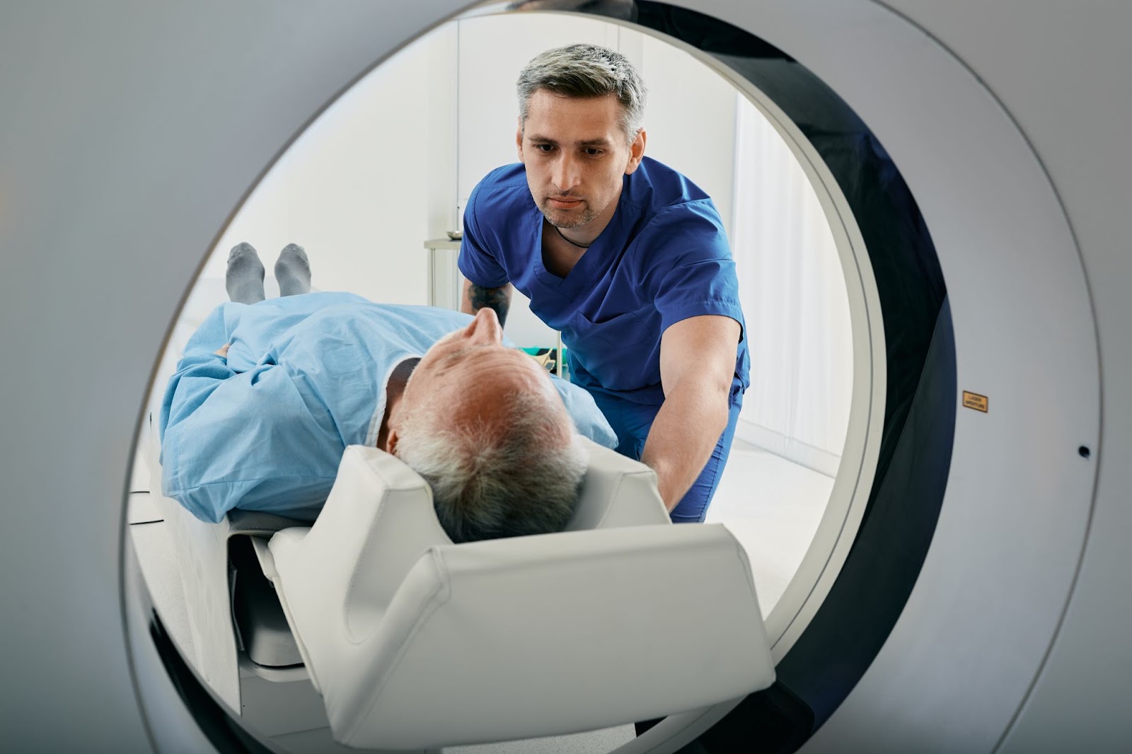 A senior going into an MRI so their doctor has more information for an Alzheiemer's diagnosis.